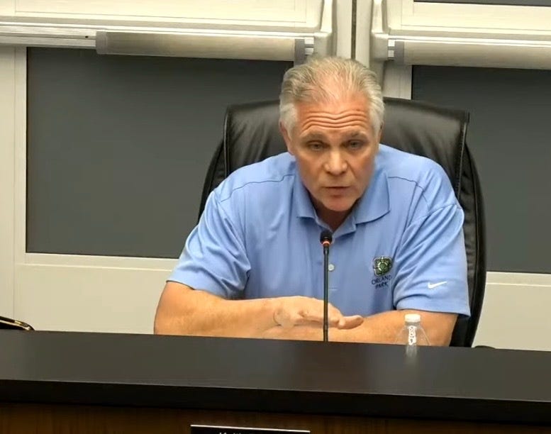 Orland Park Mayor Keith Pekau speaks during a village board meeting.