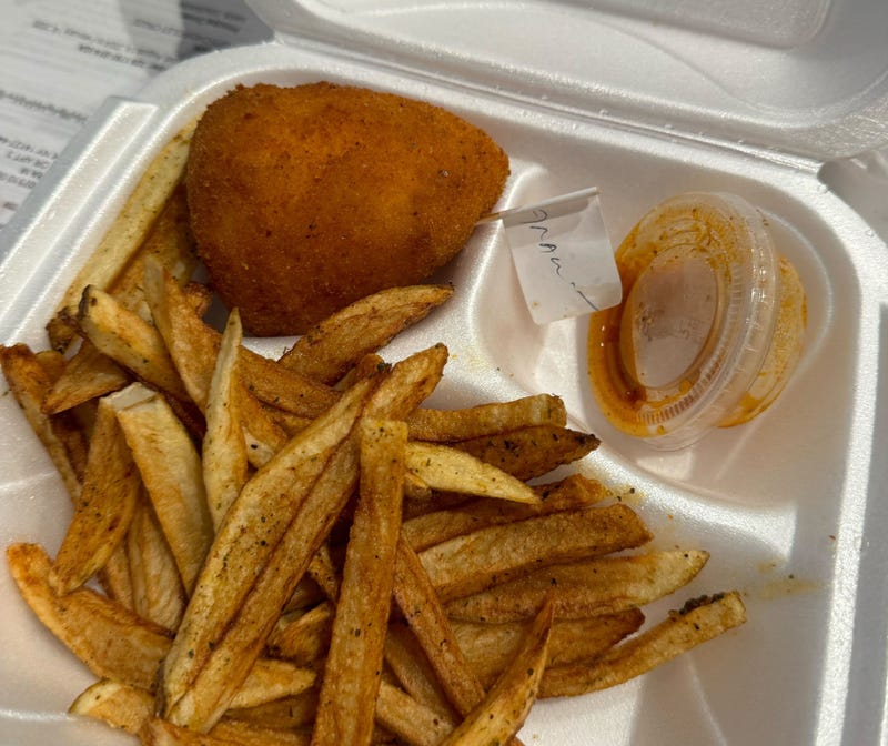 The Italian arancini from Amici-Chicago. Arancini is an Italian dish in which rice balls are stuffed, breaded and deep-fried. At Amici, the dish is served in African, Mexican, Indian, Caribbean and Italian styles.