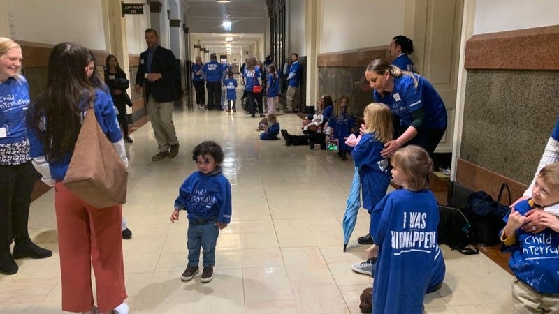 Families assemble at City Hall for a preliminary hearing in 2025 in a lawsuit against Lehigh Valley Health Network.