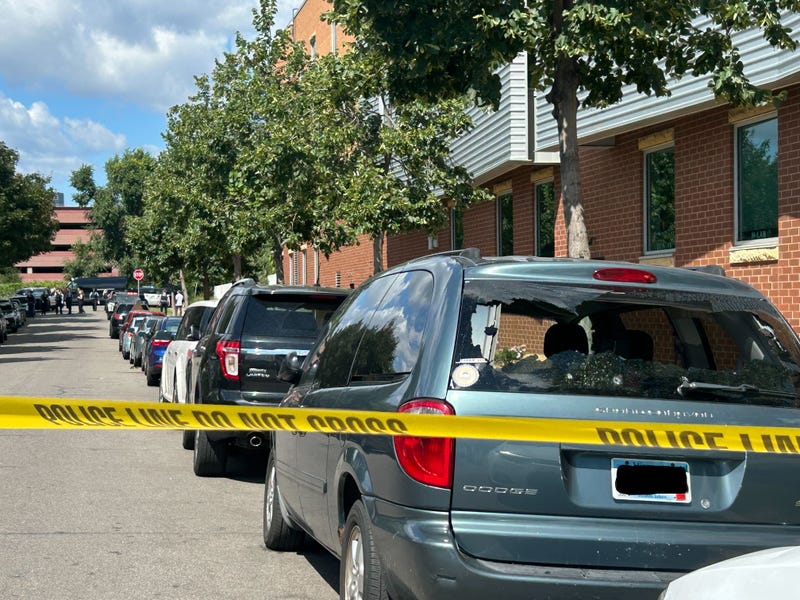 The shooting scene in south Minneapolis near Lake Street and Clinton Ave left one dead, injured six others, and left the windows of some vehicles shot out.