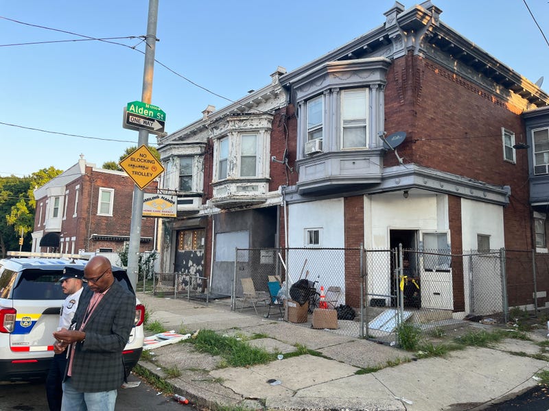 Police investigate the scene of a shooting during a block party that injured six and killed three, July 21, 2024.