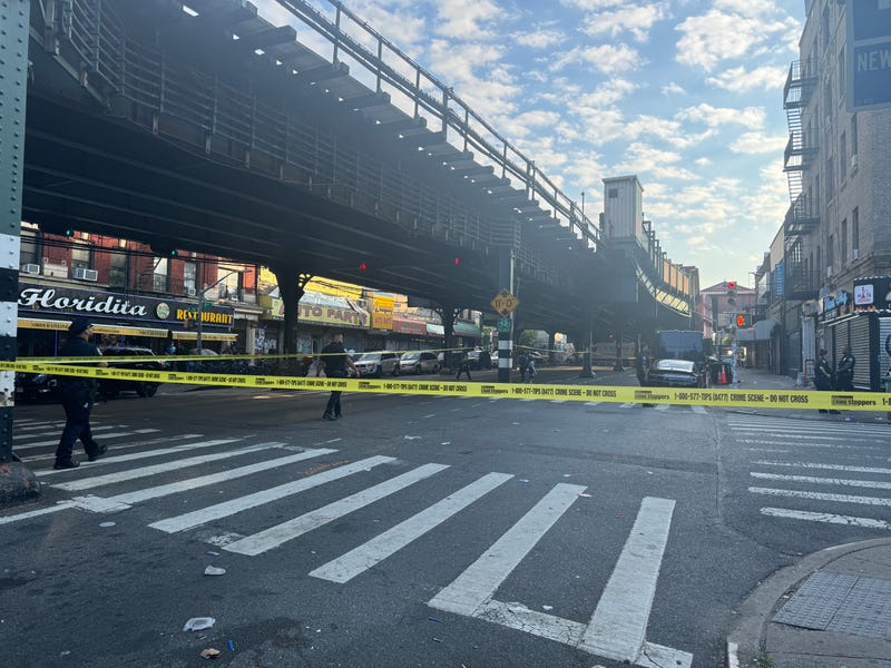 Police investigate at the scene on Monday morning