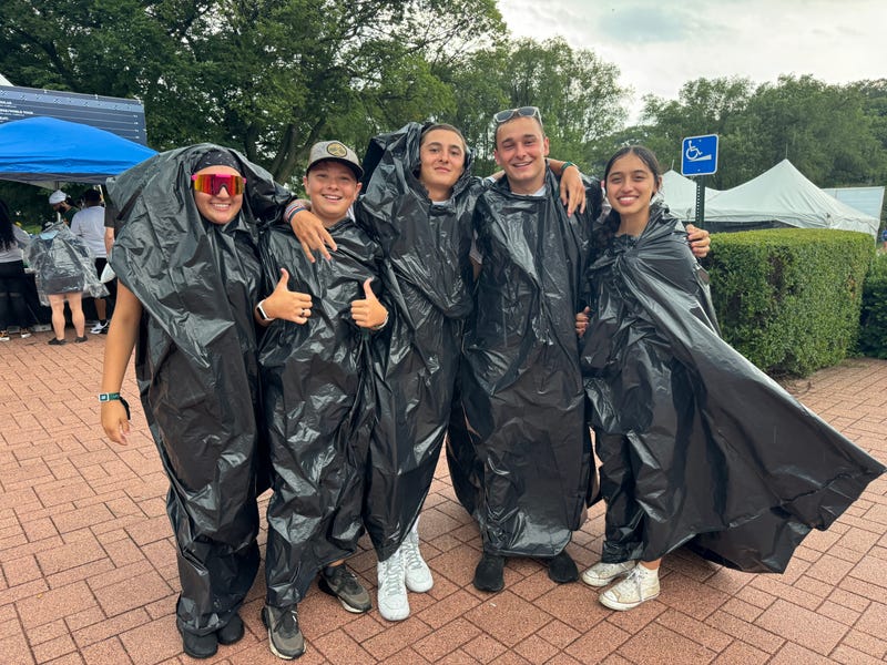 fans in ponchos 