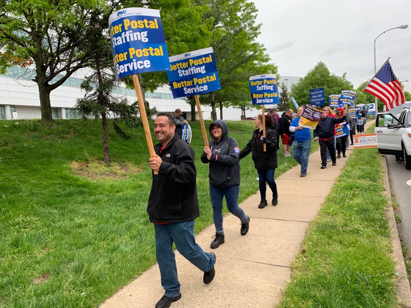 American Postal Workers Union Local 89 members picketed outside the mail processing center in Southwest Philadelphia over a nationwide staff shortage that has created toxic working conditions, April 28, 2023.