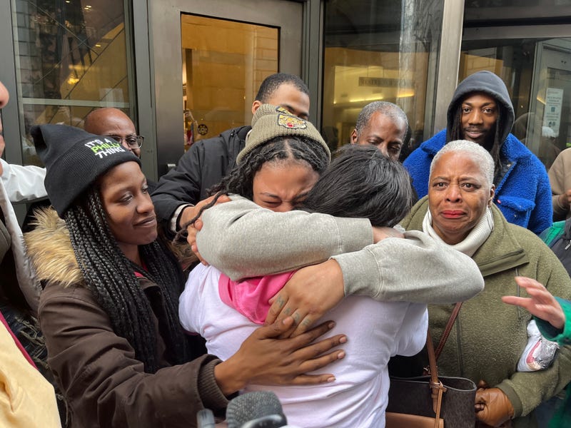India Spellman hugs her mom after being released from prison custody on Feb. 9, 2023. A judge has dismissed her 2013 murder conviction.