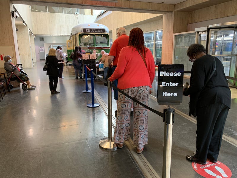 Seniors waiting for their Senior Fare Card