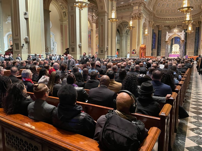Mourners gather inside the Cathedral Basilica of Saints Peter and Paul for the funeral for slain Temple University Police Officer Christopher Fitzgerald.