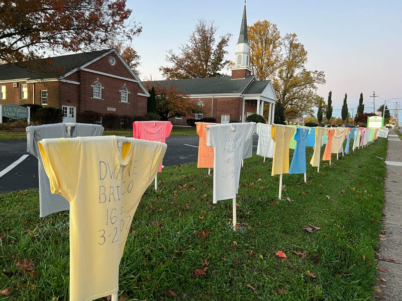Shirts representing lives lost to gun violence stretch along the lawn of Tree of Life Church in Springfield, Pa.