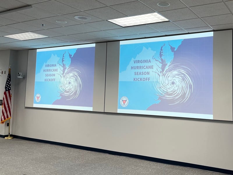 a projector screen that reads "Virginia Hurricane Season Kickoff"