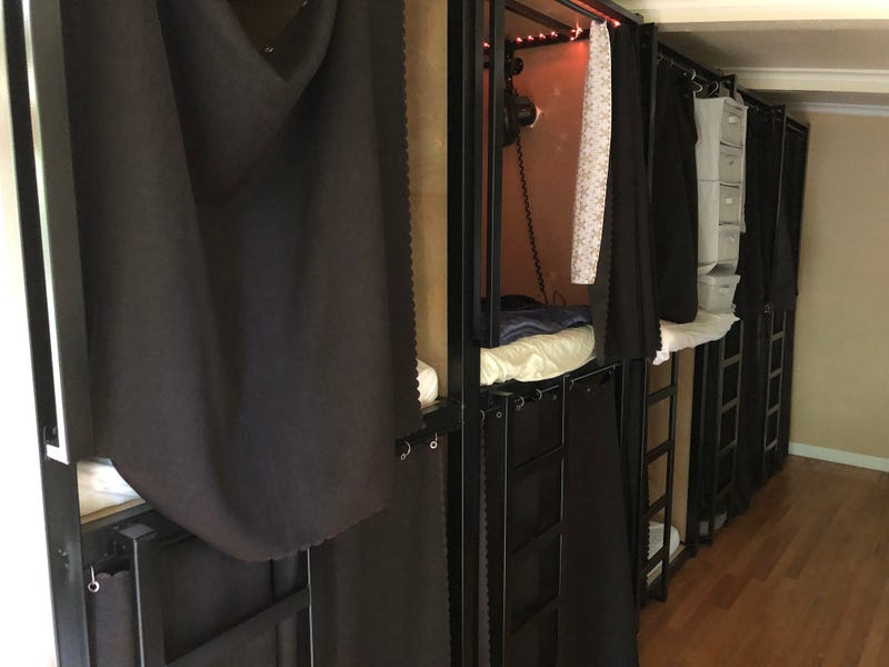 The pods are stacked on top of one another like bunk beds.