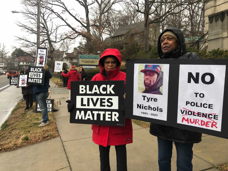 Dozens of people outside the Unitarian Society of Germantown on Lincoln Avenue in West Mount Airy on Tuesday protested police brutality in the wake of the death of Tyre Nichols in Memphis, Tennessee.