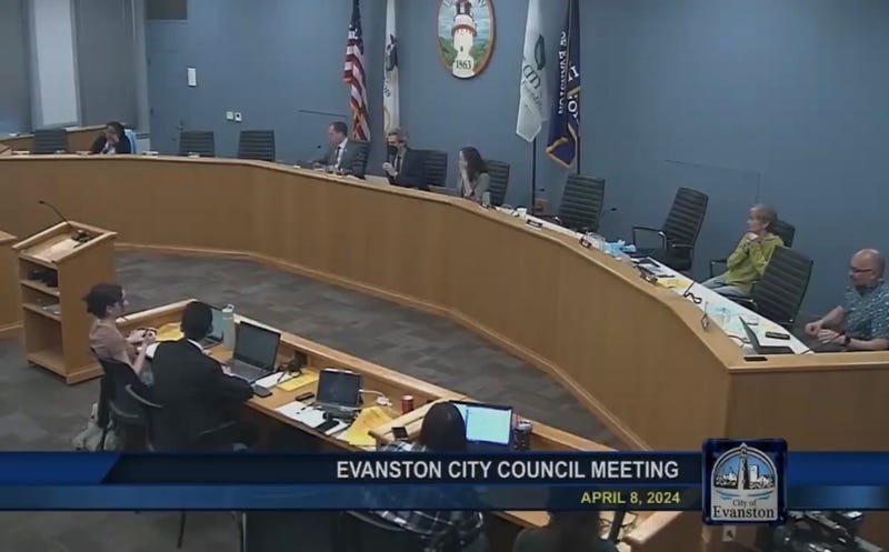 Evanston City Council debated a proposal to turn vacant office space into a migrant shelter on Monday night.