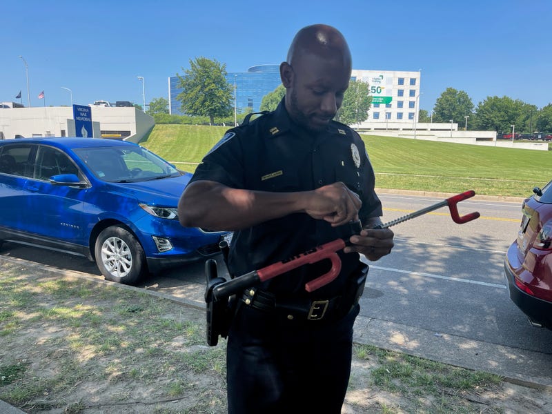 RPD Captain Anthony Jackson demonstrates a steering wheel lock