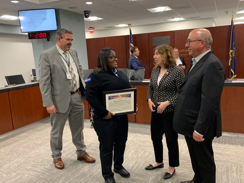 SEPTA bus driver Dysheena Donerson (center) talks with SEPTA Chief Operating Officer Scott Sauer (left), CEO Leslie Richards and Board Chair Pat Deon (right).
