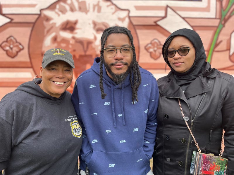 From left: Robert Wilson's stepmother Diane Harris, brother Dareon Wilson and sister Shaki’ra Wilson-Burroughs say they appreciate the annual gesture from the Philadelphia Police Department.