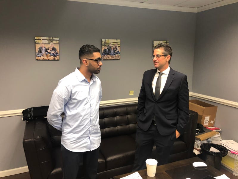 Ryan Pacheco, left, with attorney Jon Bell.