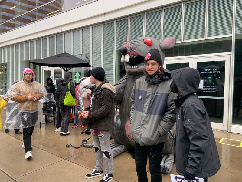 Starbucks workers protesting outside a location in University City on Friday.