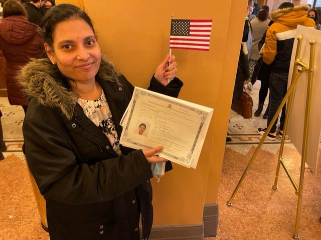 For the first time, the Auditorium Theater hosted a naturalization ceremony Monday in which nearly 500 people from 82 countries were sworn in as U.S. citizens. One of whom was Serena Panthangi from India.