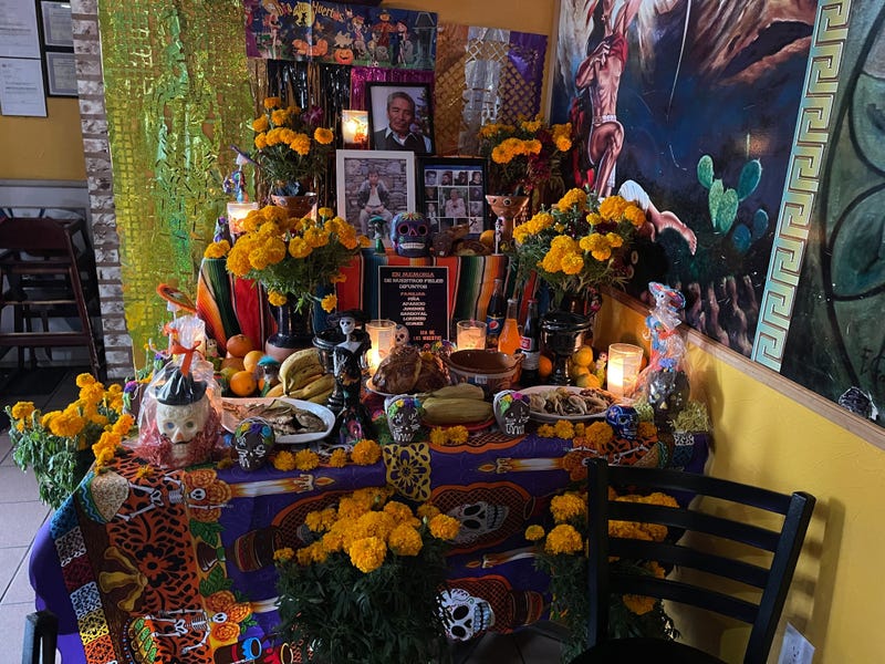 An altar, or "ofrenda," is erected at Ninth and Federal streets by the Association of Mexican Business Owners of Philadelphia to honor its recently passed member Andrea Gonzalez.