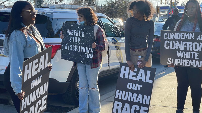 Protesters demonstrated outside St. Hubert Catholic High School for Girls on Friday.