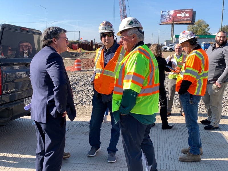PennDOT Secretary Michael Carroll speaks with construction crews at the construction site on Nov. 6, 2023.