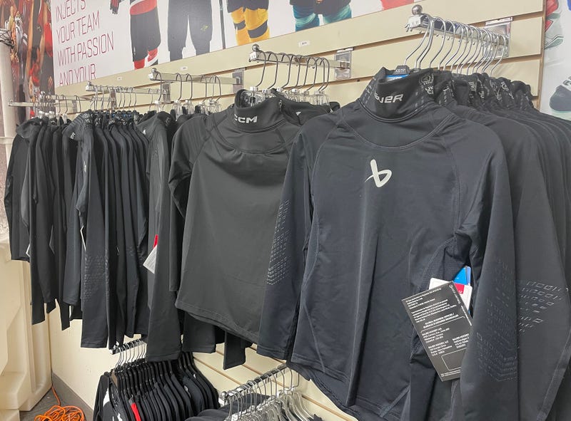 Neck guard compression shirts