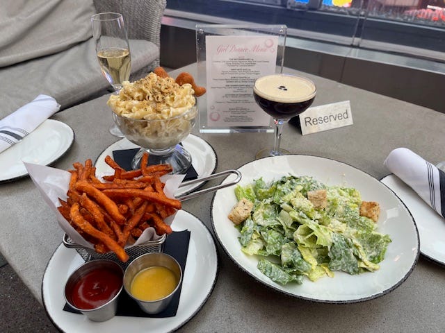 Champagne, Dino-Mite Duo and Girl Dinner Happy Meal from the Girl Dinner menu.