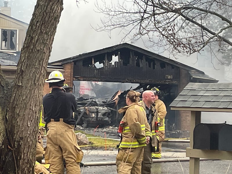 Authorities warned traffic will be slow moving along Woodward Ave. in Bloomfield Hills as crews work to control a fire that broke out at a condominium late Friday morning.