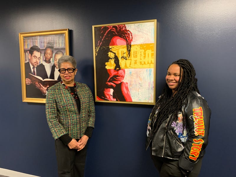 From left: Joyce Wilkerson with artist Sydney Carter