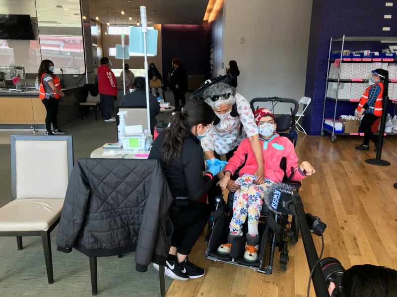Scenes from the COVID-19 vaccine clinic hosted by the Special Olympics.