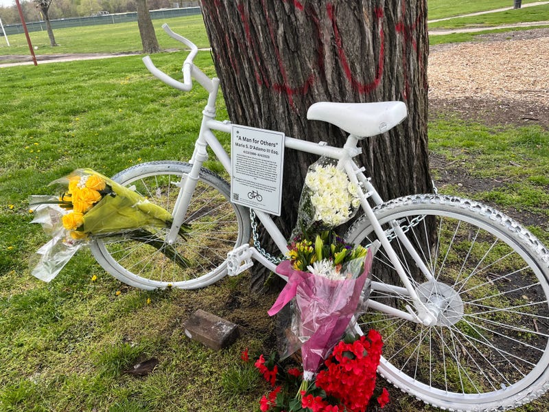 Mario D’Adamo’s parents and others gathered in FDR Park at a so-called “ghost bike” — a bike, spray-painted white, and chained to a post or a tree near the site of the cyclist’s death — set up in his memory.