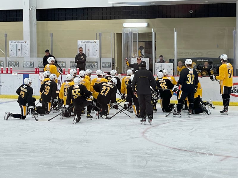 Pens players in huddle at development camp