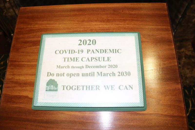 Sally Shabaker says the residents of Whitehorse Village in Newtown Square, Pa., put 99 items in a time capsule to help document the first year of the coronavirus pandemic.