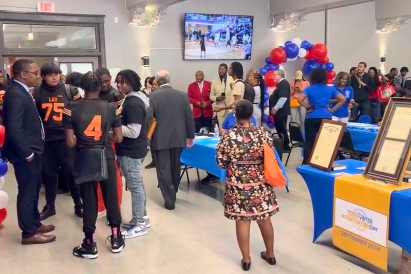 Students from Leo Catholic High School in Chicago's Auburn-Gresham neighborhood participate in a voter registration drive on Sept. 10, 2024.