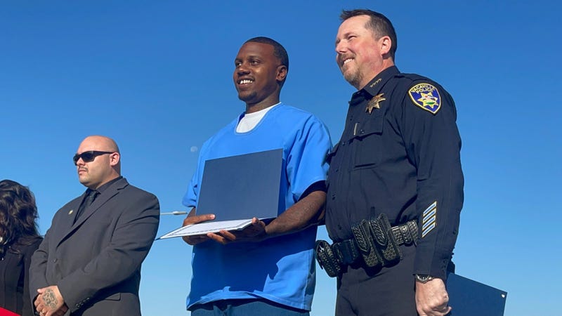Davion Howard and Officer David Peebles were honored on Thursday.