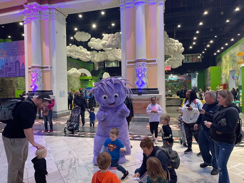 Kids and families gather to watch the ball drop at the Please Touch Museum on New Year's Eve.