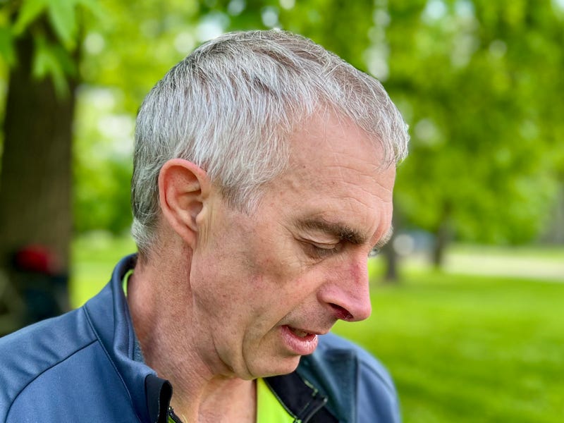 SLU Biology Professor Stephen Blake sits outside the boathouse in Forest Park, where he and other researchers have launched the Forest Park Living Lab