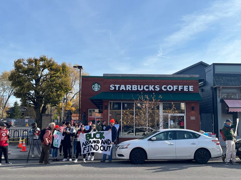 A group of Starbucks workers gather to strike at the first unionized Starbucks location on Elmwood Avenue in Buffalo, N.Y.