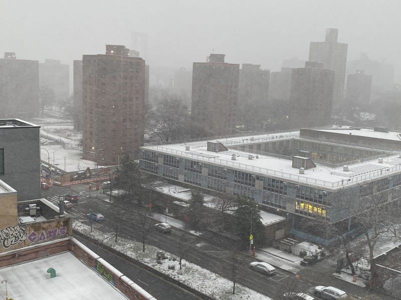 Snow falls on the East Village on Feb. 13, 2024