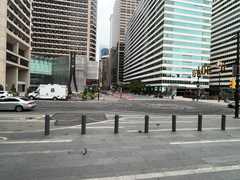 Black skid marks announce the location of an illegal car meet overnight at 15th and Market streets.