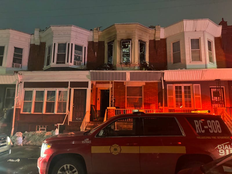 Fire truck sits outside of Southwest Philly house fire that left one man dead