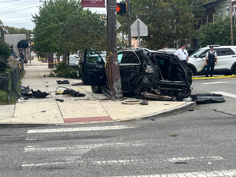 Two people were injured after a carjacking suspect fled police and crashed into an SUV driven by a school principal in the city’s Tacony neighborhood. 