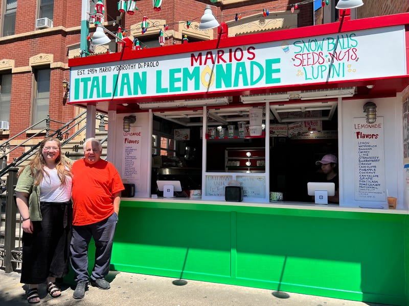 Mario DiPaolo and daughter Davinia stand in front of Mario's Italian Lemonade stand