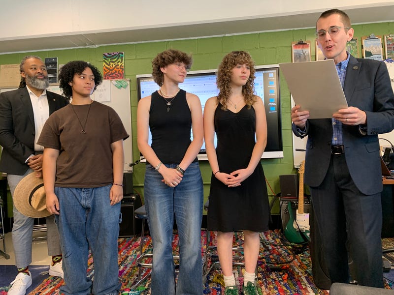 From left: Philadelphia Board of Education President Reginald Streater looks on as Science Leadership Academy students Clarissa Lanzas, El Palmer and Violet Brenner are honored by C-SPAN's Zach Lowe.