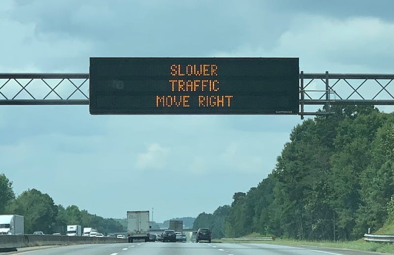 Electronic DMV signs in South Carolina remind drivers of new legislation requiring slow drivers in the passing lane to pull over.