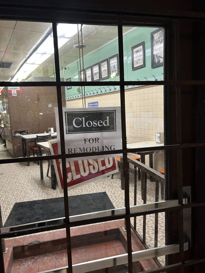 "Closed for remodeling sign" on door at Lafayette Coney Island
