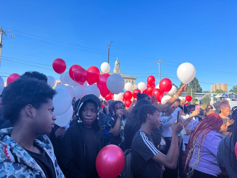 Hundreds of children gathered in West Philadelphia to release white and red balloons in memory of Hezekiah Bernard.