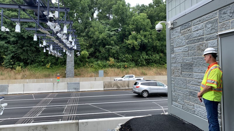 Pennsylvania Turnpike engineering manager Alan Williamson looks at a toll gantry in King of Prussia.