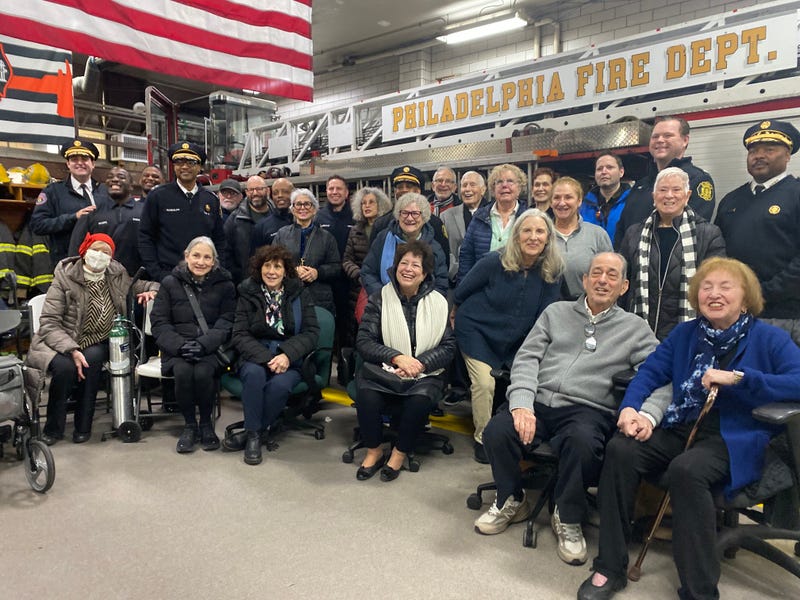 Beverly Rubin (bottom right) reunites with the medics who saved her life, Jan. 13, 2026.