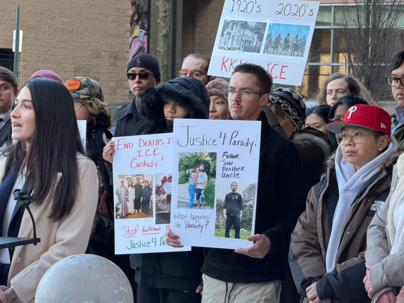 Supporters hold signs for Parady La at the Philadelphia Federal Detention Center on Feb. 5, 2026.